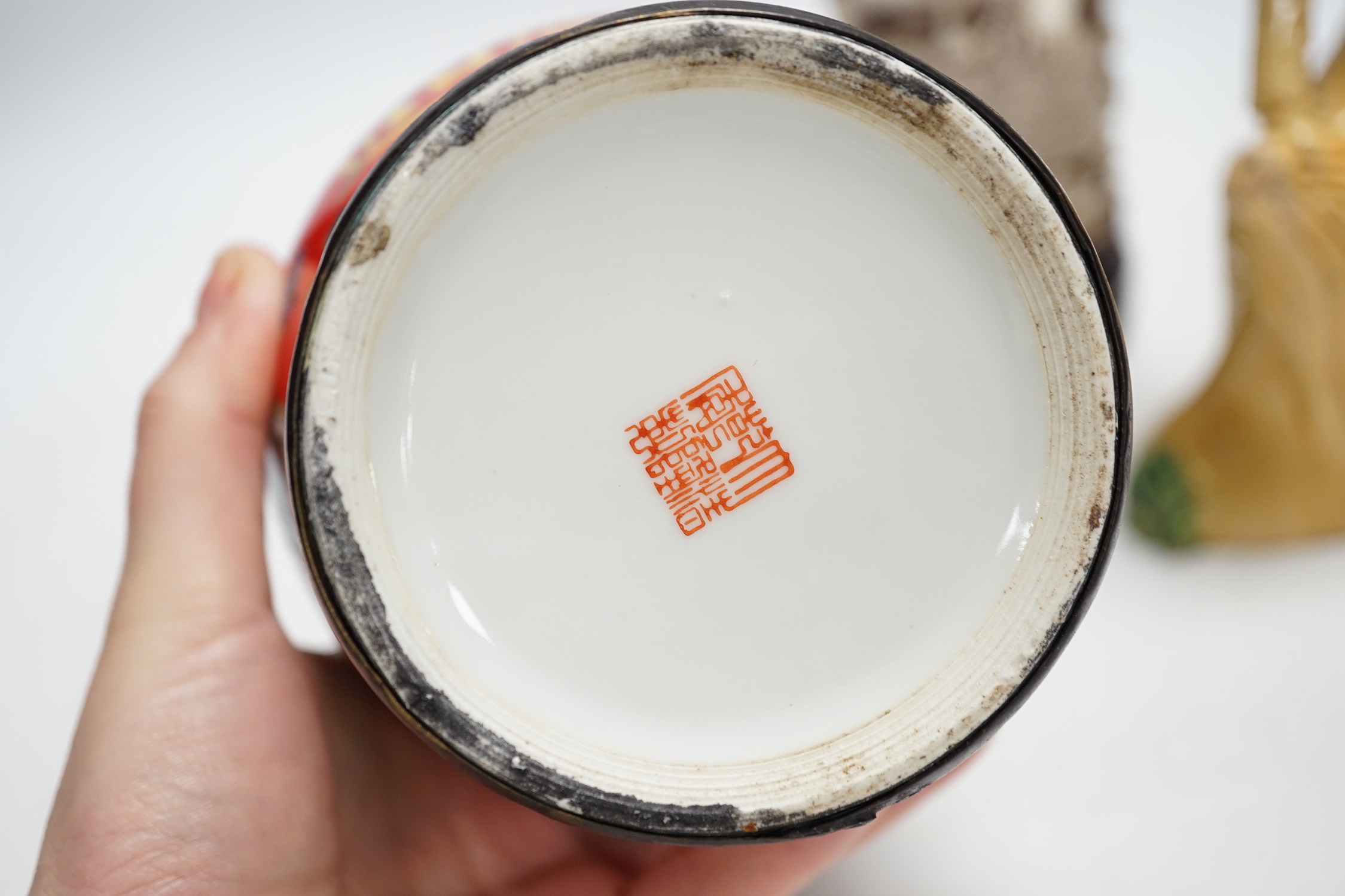 A group of Chinese ceramics 18th century and later, including a bottle vase, a water pipe vessel, box and cover, three bowls, a Tang style figure of a lady, a Yixing teapot, together with a resin figure of an emperor